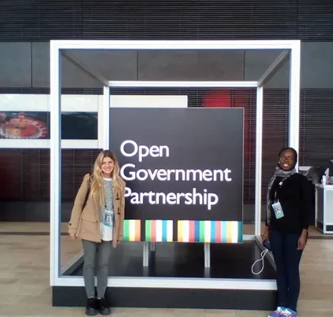 Two women at a conference.